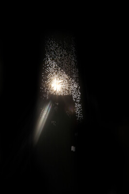 Illuminated cardboard model of the Lighthouse’s upper wall, showing light passing through Fresnel lenses set within openings in the concrete