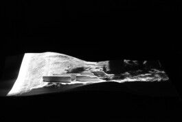Computational particle simulation of shifting dunes projected onto the Sandhouse plaster model by Jurgis Gečys, 2014