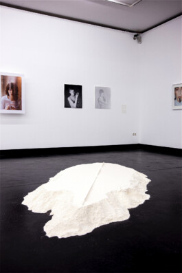 Installation view of Jurgis Gecys’ The Traces of Gesture and non-body-non-space at Eye to Eye with Man Ray, tresor, Bank Austria Kunstforum Wien, Vienna, 2018. White flour landscape with two black-and-white photographs.