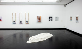 Installation view of Jurgis Gecys’ The Traces of Gesture and non-body-non-space at Eye to Eye with Man Ray, tresor, Bank Austria Kunstforum Wien, Vienna, 2018. The flour installation occupies the foreground, with Gesture 1 and Gesture 2 displayed on the wall behind.