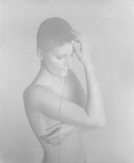 Gesture 1 from The Traces of Gesture, 2018. Black-and-white analogue photograph of a nude figure intersected by a continuous dark line.