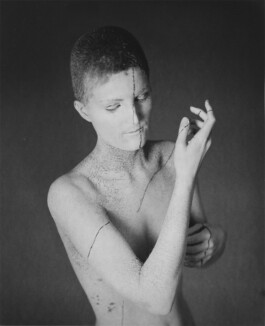 Gesture 2 from The Traces of Gesture, 2018. Black-and-white analogue photograph of a nude figure intersected by a continuous dark line, with the gesture shifting away from alignment.