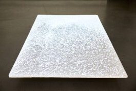 The Memory of the Ground, 2020, by Jurgis Gečys – jesmonite sculpture with video projection, Chapter 3, revealing the imprinted surface as a dense field of light.