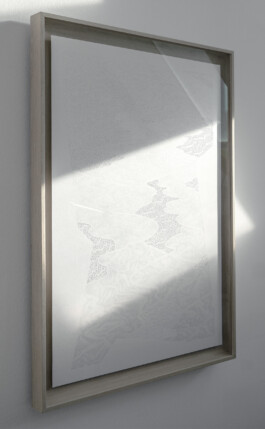 The Paths of River, 2025, by Jurgis Gečys. Framed vertical hand drawing in pigment ink on paper, photographed from an oblique angle in natural light. Broad bands of sunlight and shadow cross the pale composition, revealing dense point-like markings, flowing river-like forms and the depth of the wooden frame.